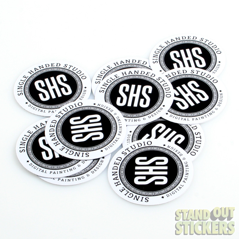 Single Handed Studio round logo stickers in black and white